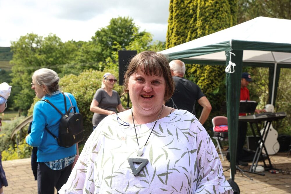 A person we support smiling